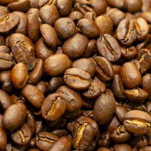 Freshly roasted whole coffee beans, close up